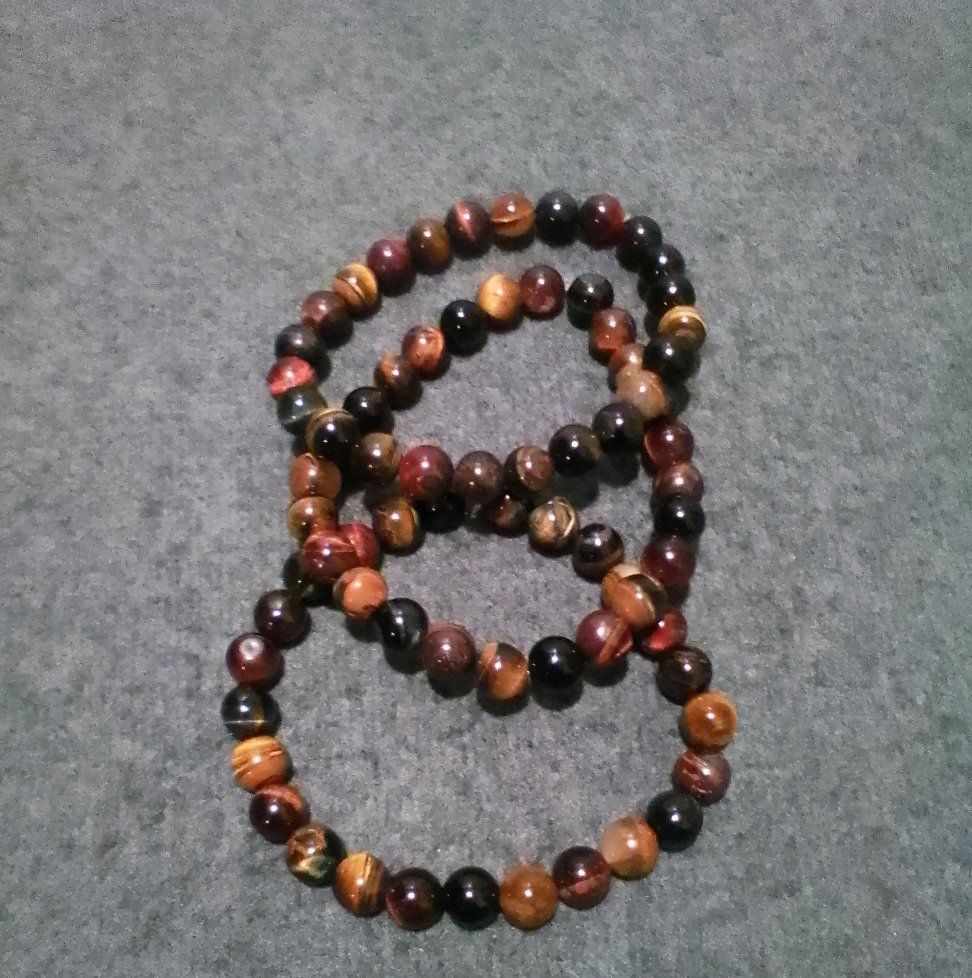 Red, Blueish Black (more pure), Golden Tiger Eye