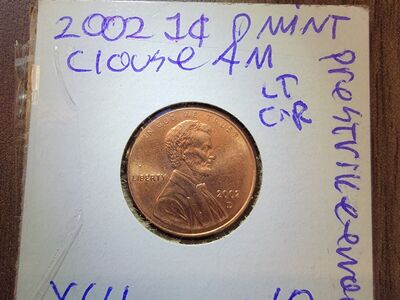 2002 penny with errors.