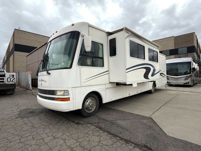 2002 National Sea Breeze 8341LX with 2 Slides