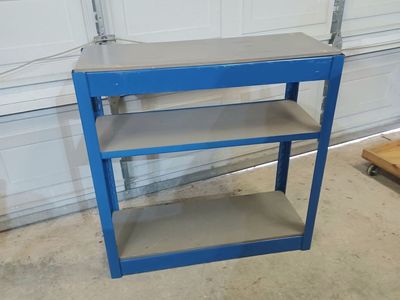 Metal and wood shelf.