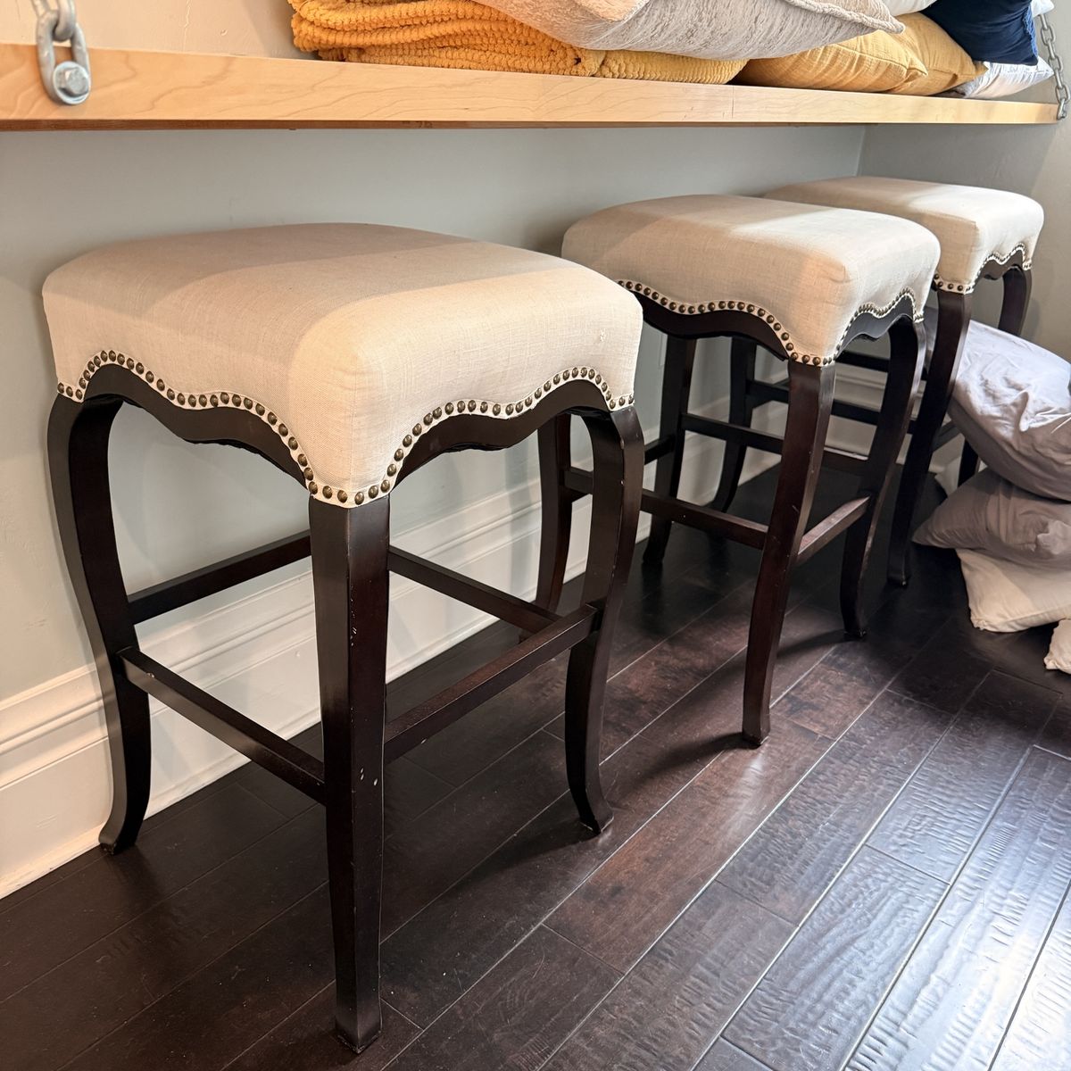 Set of 3 Upholstered Bar Stools - Cream Fabric, Nailhead Trim, Dark Wood Legs
