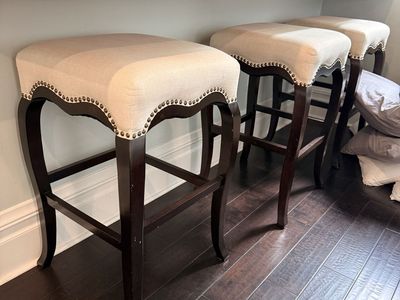 Set of 3 Upholstered Bar Stools - Cream Fabric, Nailhead Trim, Dark Wood Legs