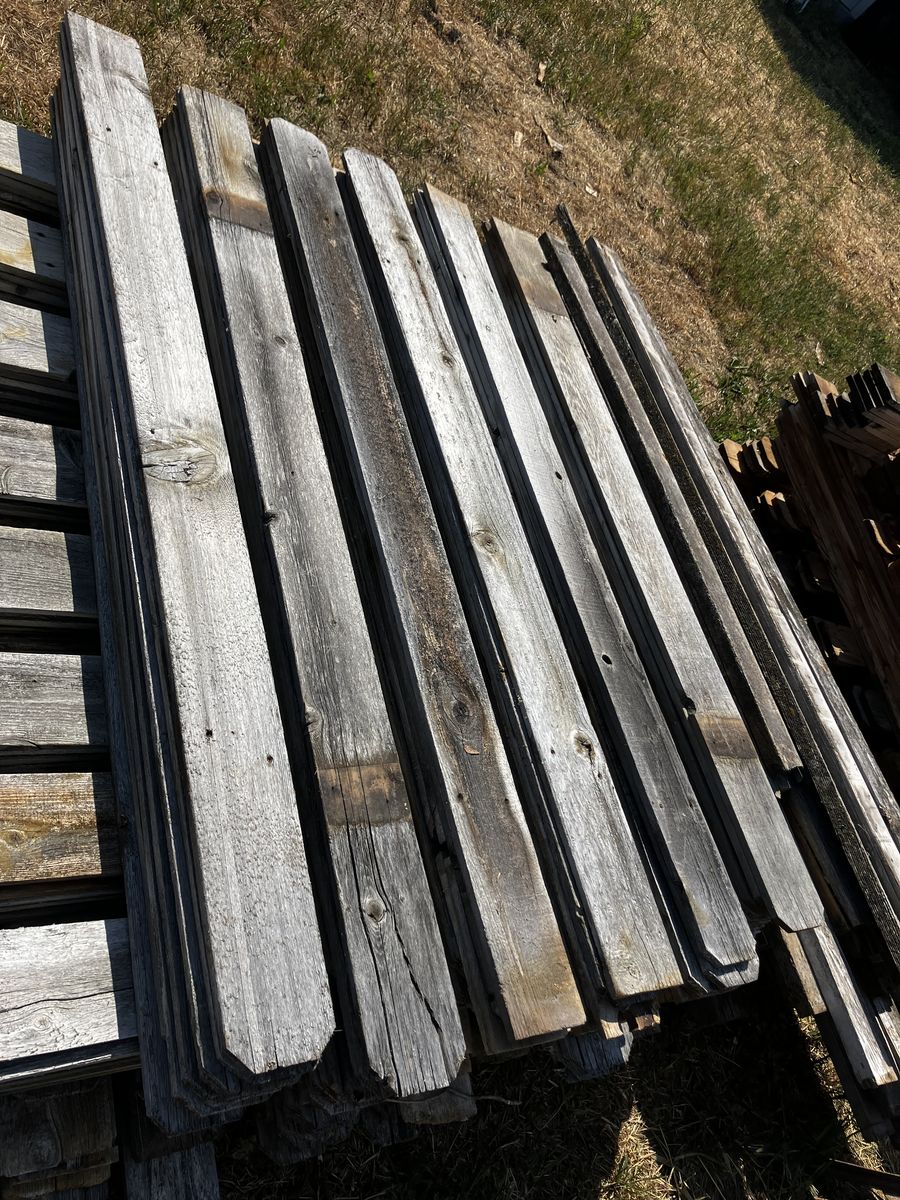 Weathered cedar fence pickets. Rustic wood