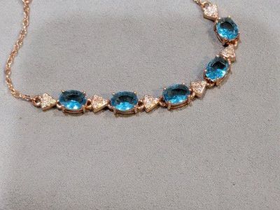 Rose Gold Tone Blue Topaz Style Gemstone Chain Link Bracelet with Adjustable Clasp