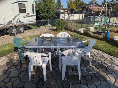 Outdoor Patio Dining Table with Glass Top and 6 Chairs - Used Condition