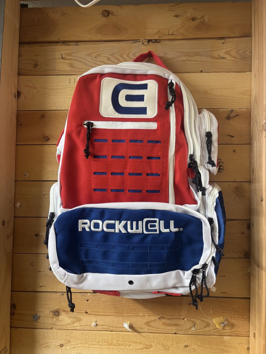 Rockwell Red White Blue Backpack with Multiple Compartments - Excellent Condition