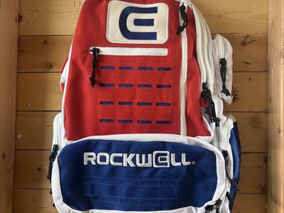 Rockwell Red White Blue Backpack with Multiple Compartments - Excellent Condition