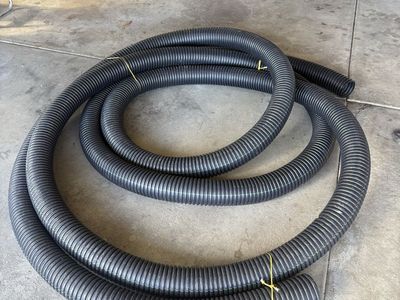 Black Corrugated Drainage Pipe - Flexible Yard and Landscaping Hose.
