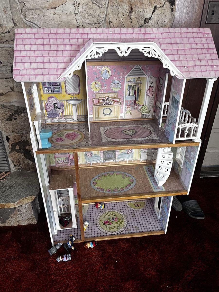 Doll house with elevators, spiral stairs, & porch