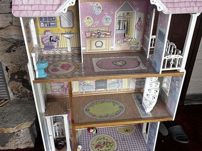 Doll house with elevators, spiral stairs, & porch