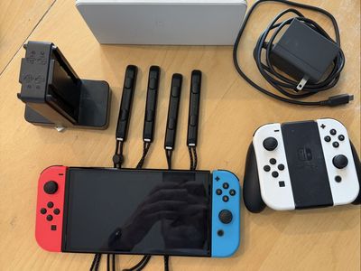 Nintendo Switch OLED (White) + Extra Joy-Cons & Charging Bundle