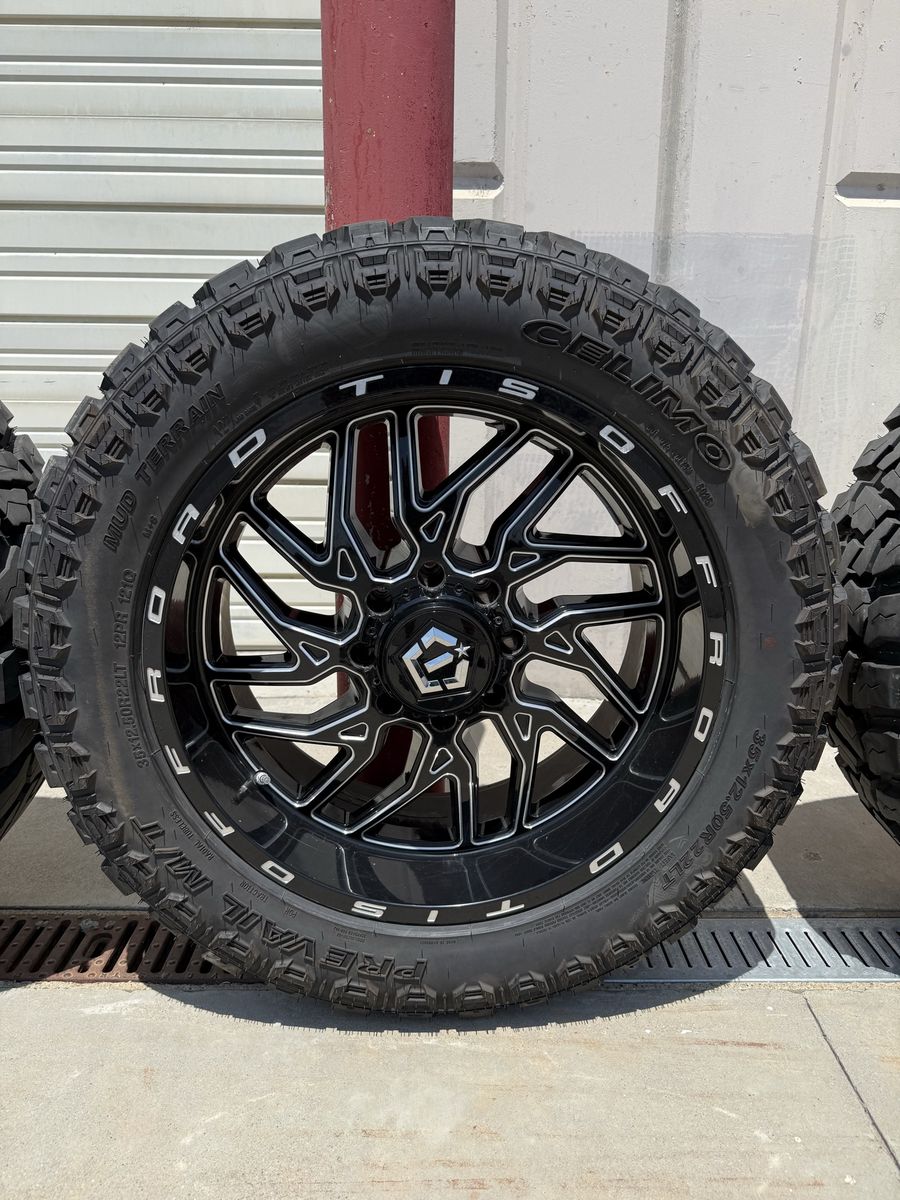 TIS 544 22” Rims gloss black with milled accents with 35’s
