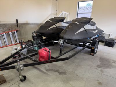 Two 2016 SeaDoo GTI 130s w/ Trailer