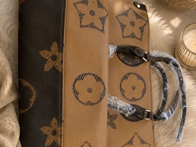 Cute designer-inspired tote bag in a pretty two-tone brown and tan print.