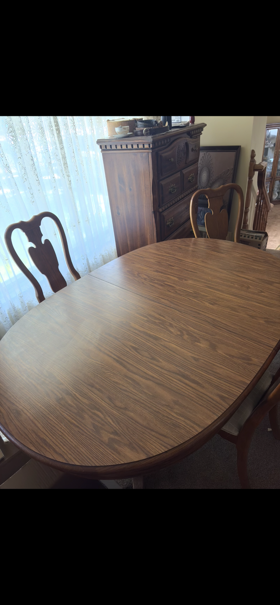 Vintage oak pedestal dining table with matching splat-back chair, extendable