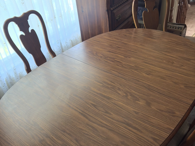 Vintage oak pedestal dining table with matching splat-back chair, extendable