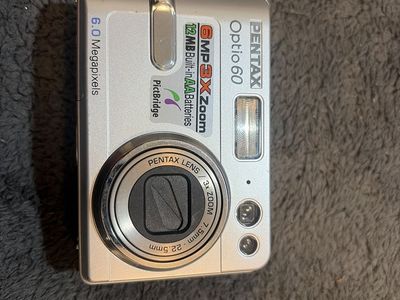 Pentax Optio 60 Digital Camera 6.0MP 3x Optical Zoom AA Battery Powered