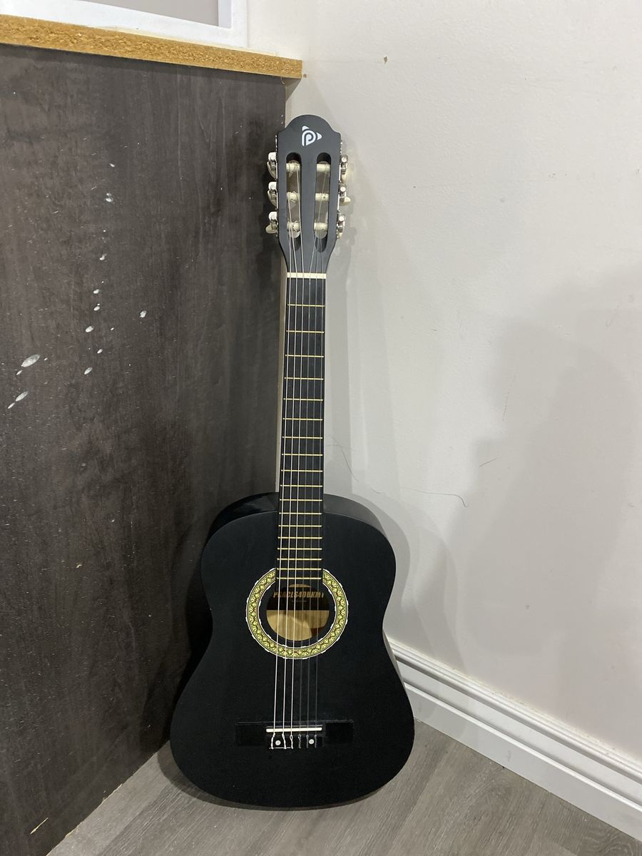 Black acoustic guitar