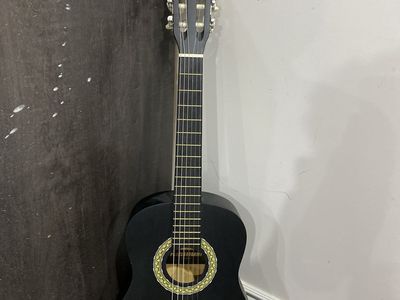 Black acoustic guitar