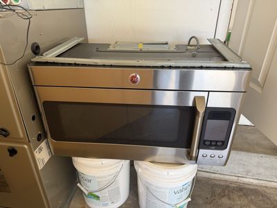 GE Cafe Over-the-Range Microwave - Stainless Steel (Damaged Door Latch)