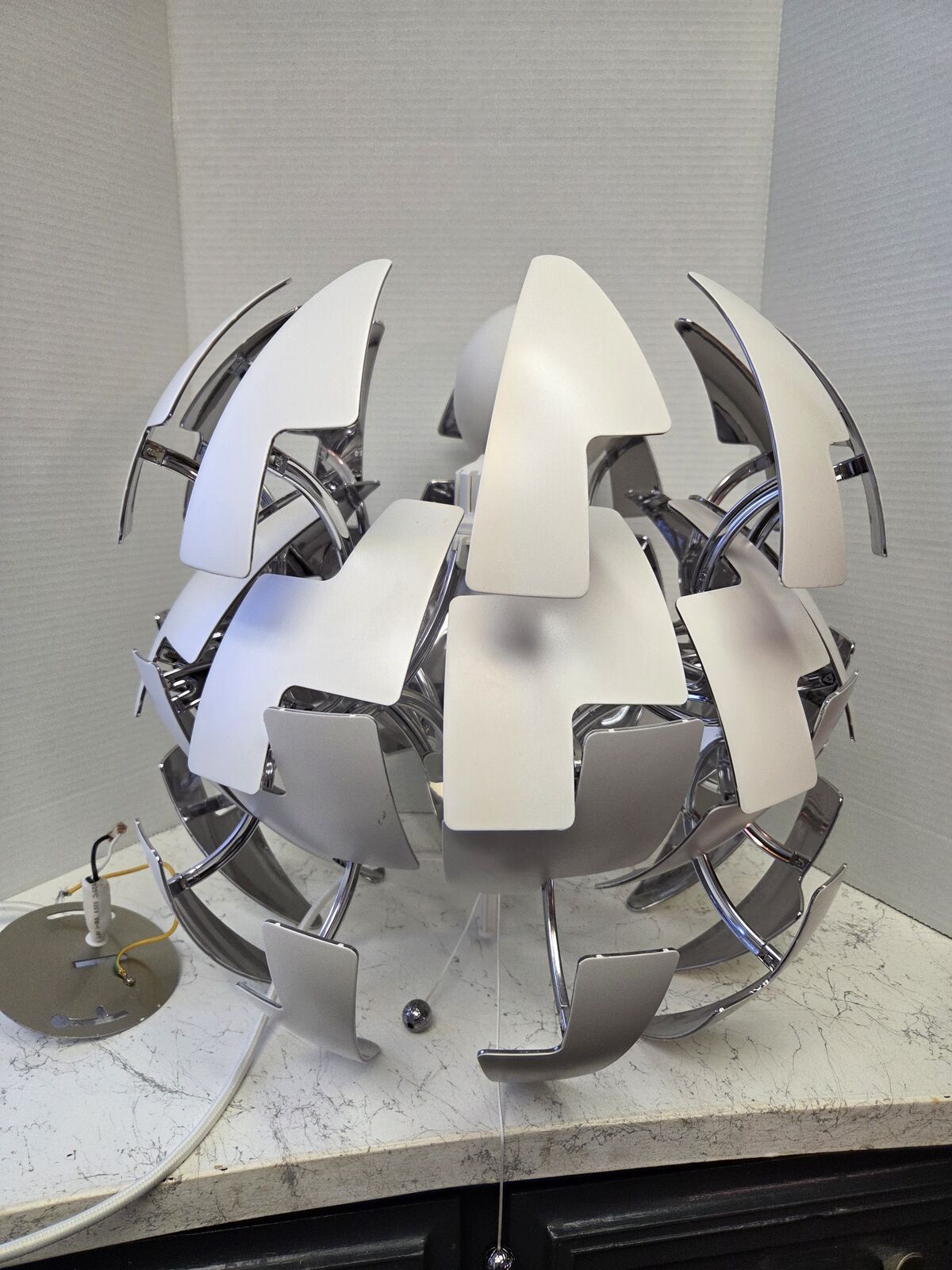 IKEA PS 2014 pendant lamp in white and silver color, designed by David Wahl