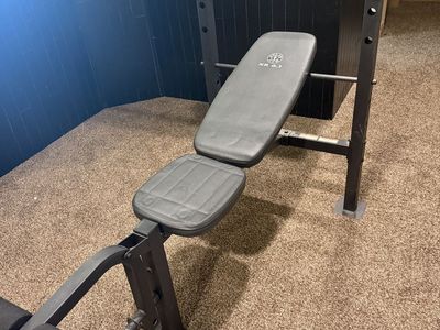 Gold's Gym XR 6.1 Weight Bench Set with Barbell and Cast Iron Weight Plates