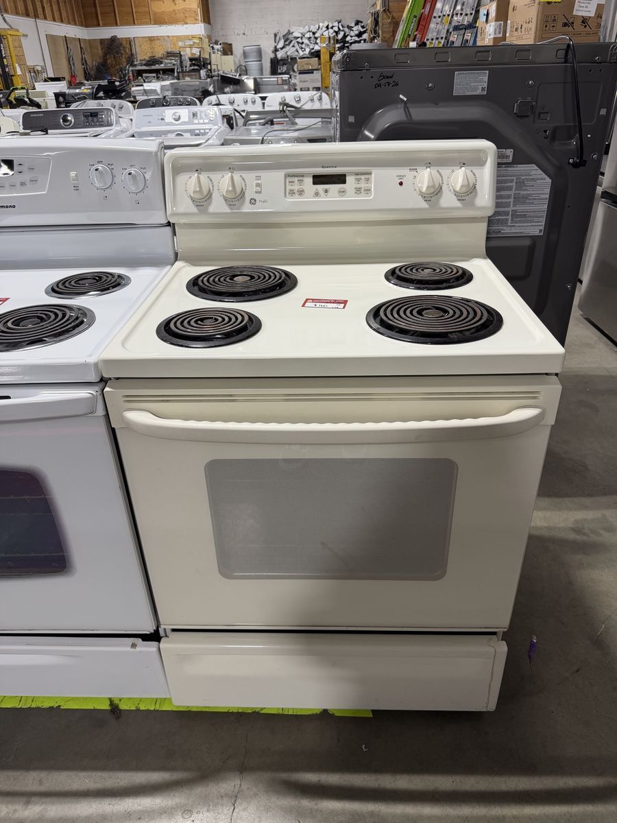 HUGE DEALS HERE! GE BEIGE COIL TOP RANGE