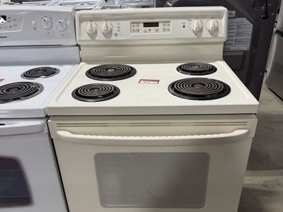 HUGE DEALS HERE! GE BEIGE COIL TOP RANGE