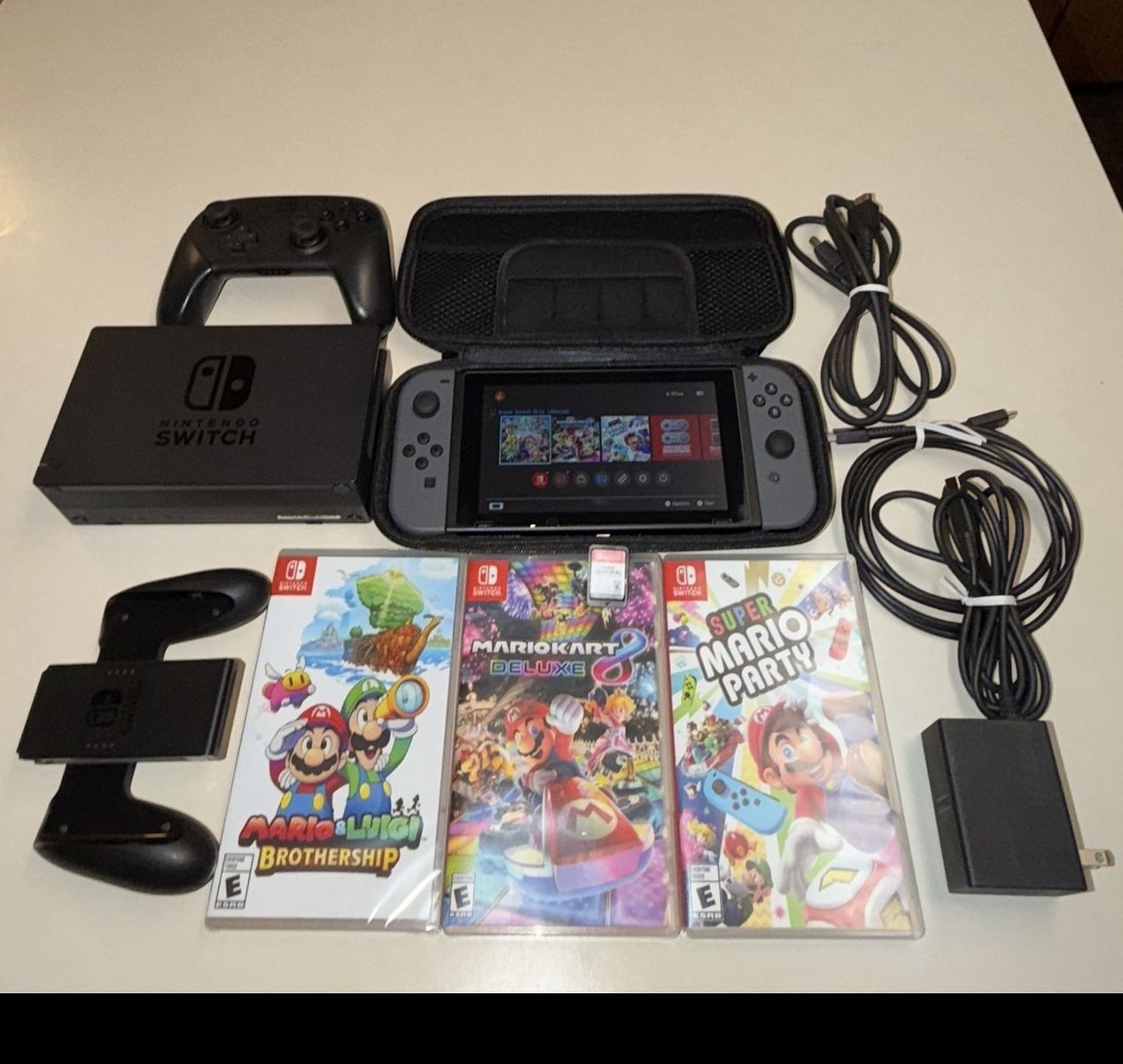 Nintendo Switch with Pro Controller and Four Games