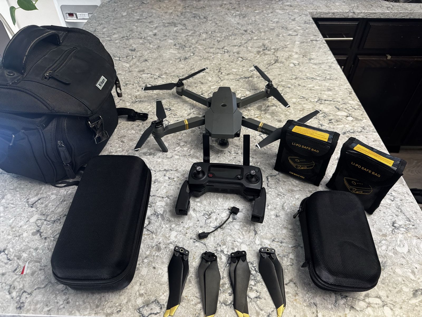 DJI Mavic Pro Drone with Controller, Case, 3 batteries, and Extra Propellers