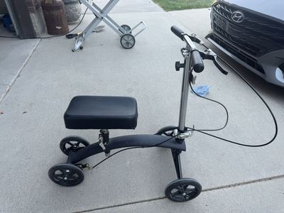 Adjustable Medical Knee Scooter with Dual Hand Brakes and Padded Knee Rest