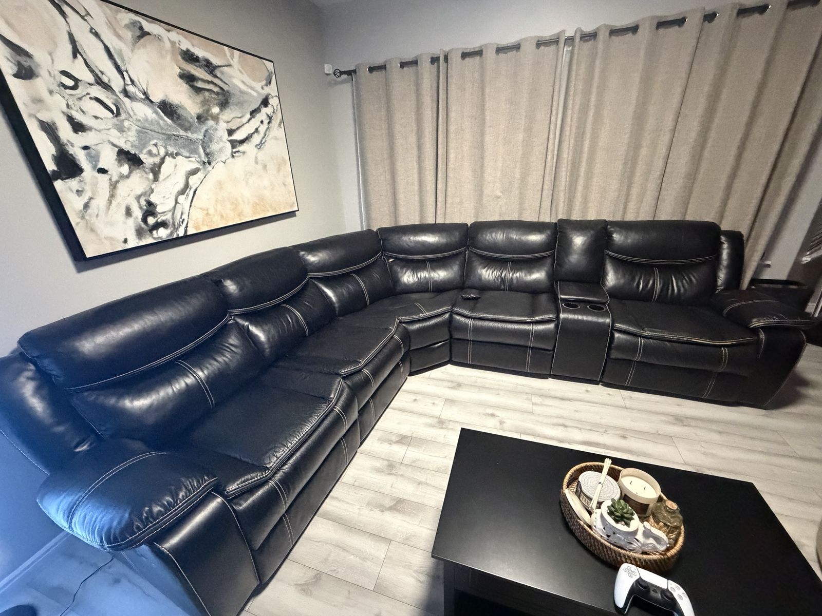 Black Leather Reclining Sectional Sofa with Cup Holders