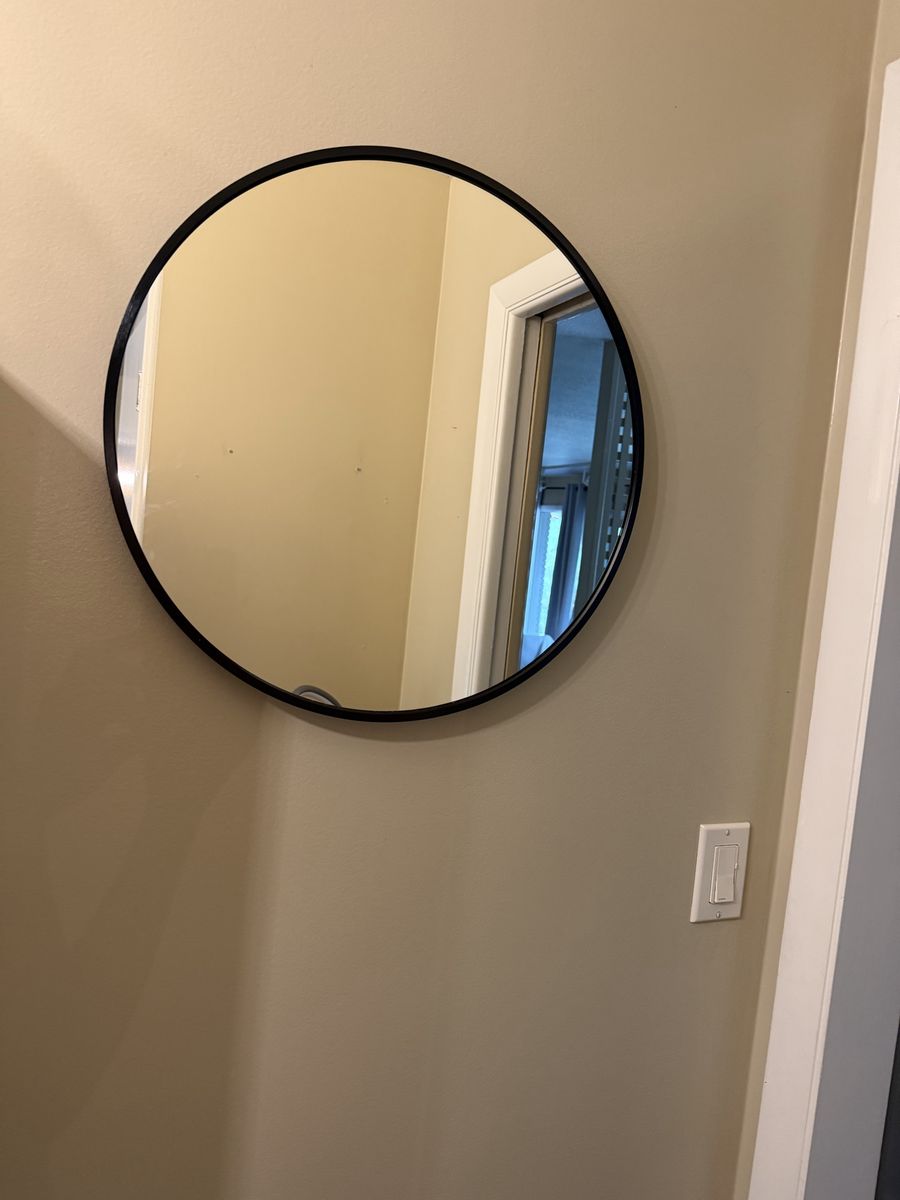Round Wall Mirror with Black Frame - Modern Home Decor Accent. Measures 20”