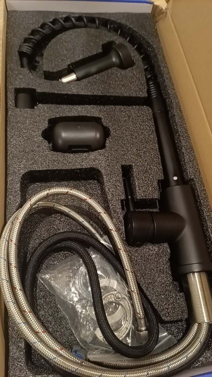 New in box Kitchen Faucet with Pull Down Sprayer