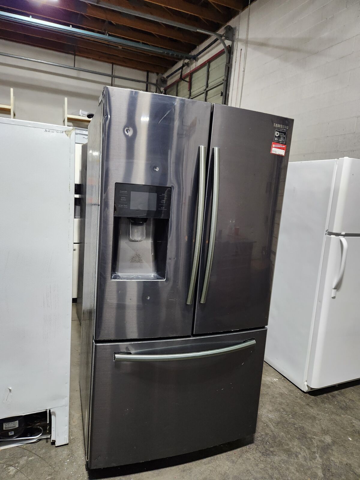 SAMSUNG FRENCHDOOR FRIDGE! WITH A FULL WARRANTY
