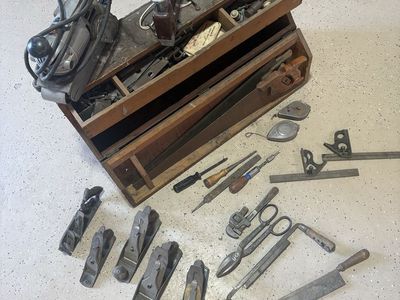Pioneer style antique carpentry and woodworking tool kit