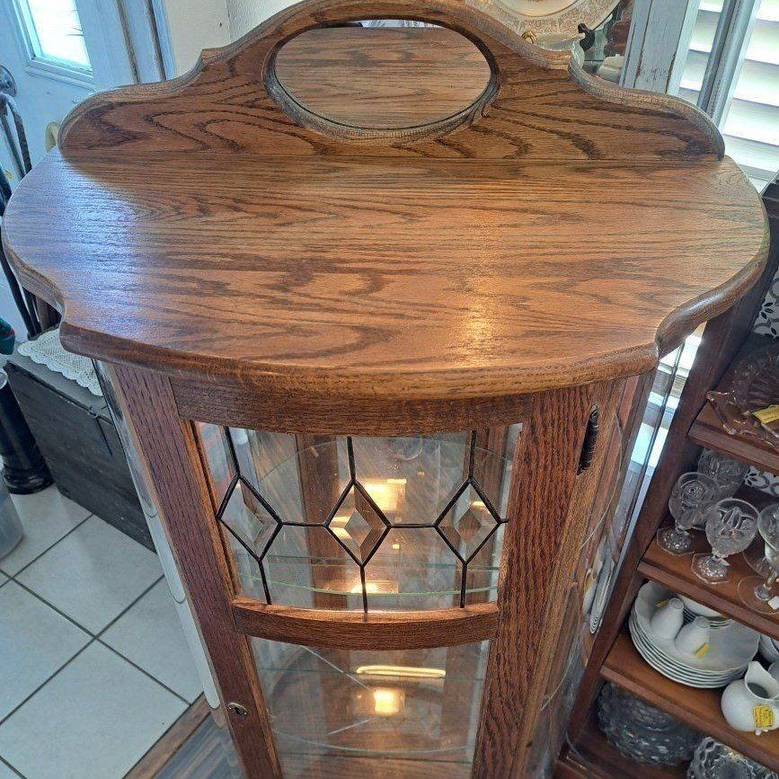 Vintage Solid Oak Lighted Curved Glass Curio Display Cabinet with Leaded Accent