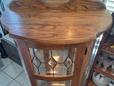Vintage Solid Oak Lighted Curved Glass Curio Display Cabinet with Leaded Accent