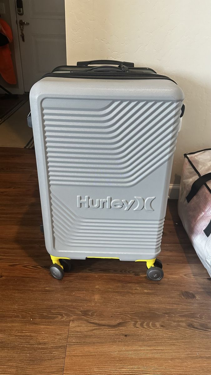 Hurley Hard Shell Spinner Suitcase - Gray with Yellow Accents 24”