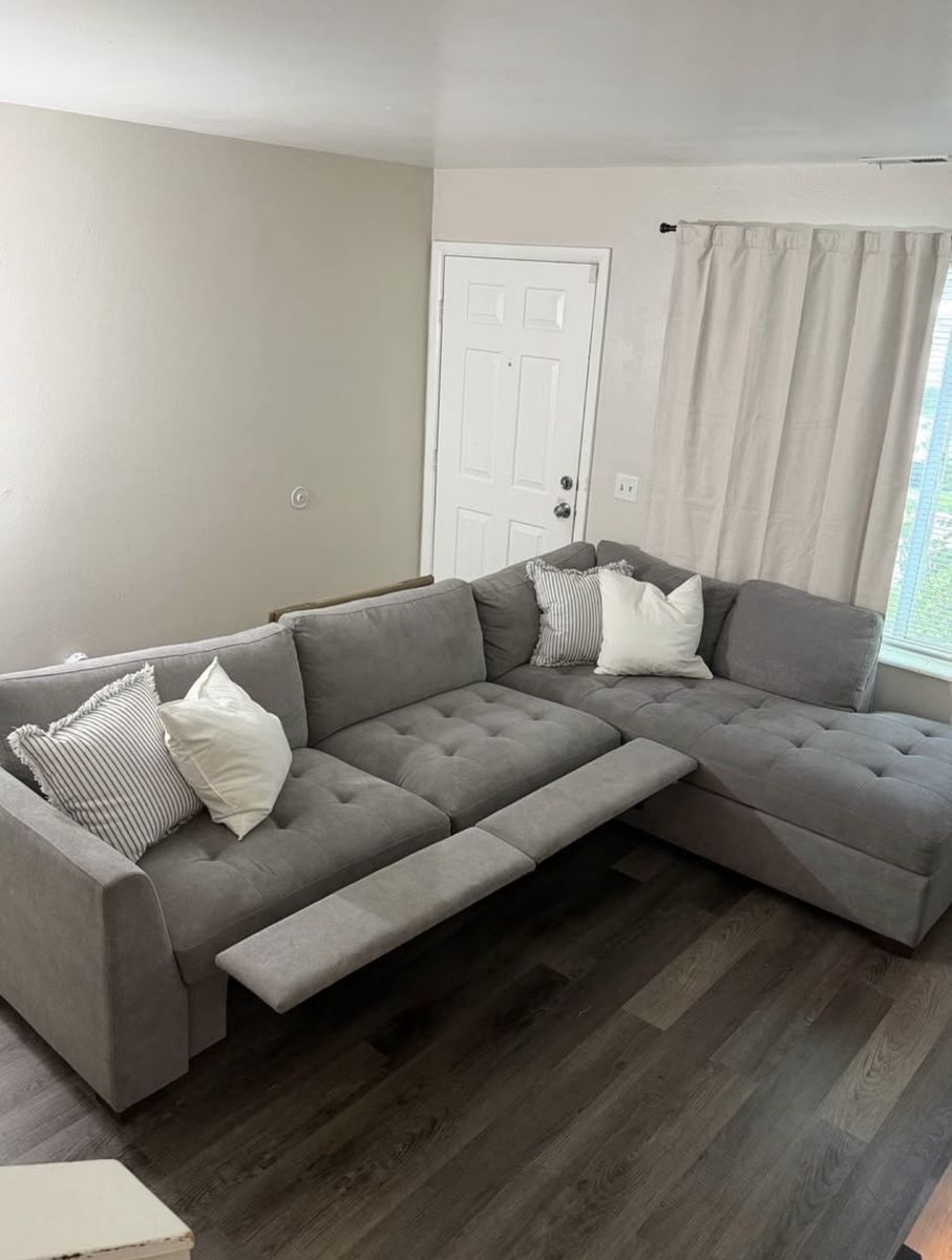 gray sectional couch with electric footrests 