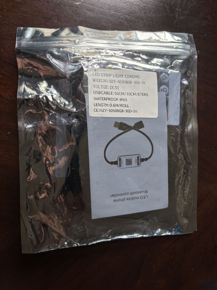 USB-powered RGB LED strip light kit with Bluetooth controller.