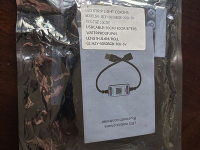 USB-powered RGB LED strip light kit with Bluetooth controller.