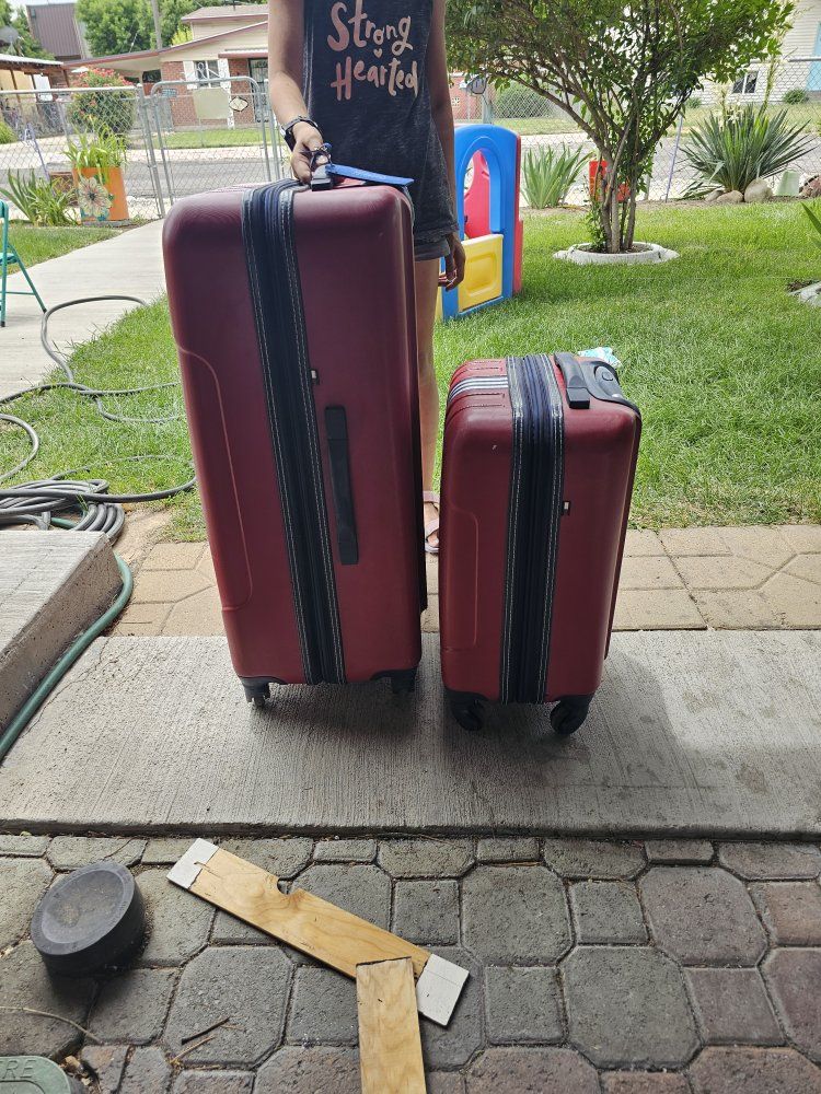Tommy Hilfiger suit cases