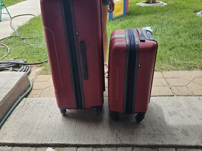 Tommy Hilfiger suit cases