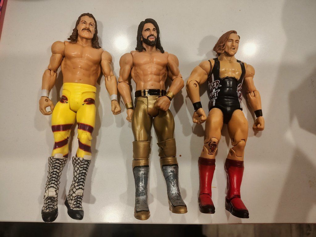 Set of 3 WWE ACTION FIGURES FOR $20