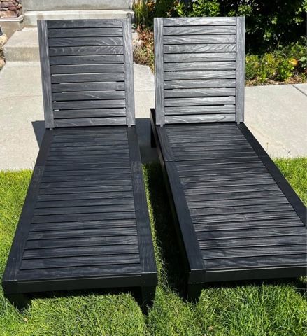 New Set of 2 Black Plastic Outdoor Chaise Lounges $50 for the pair. 