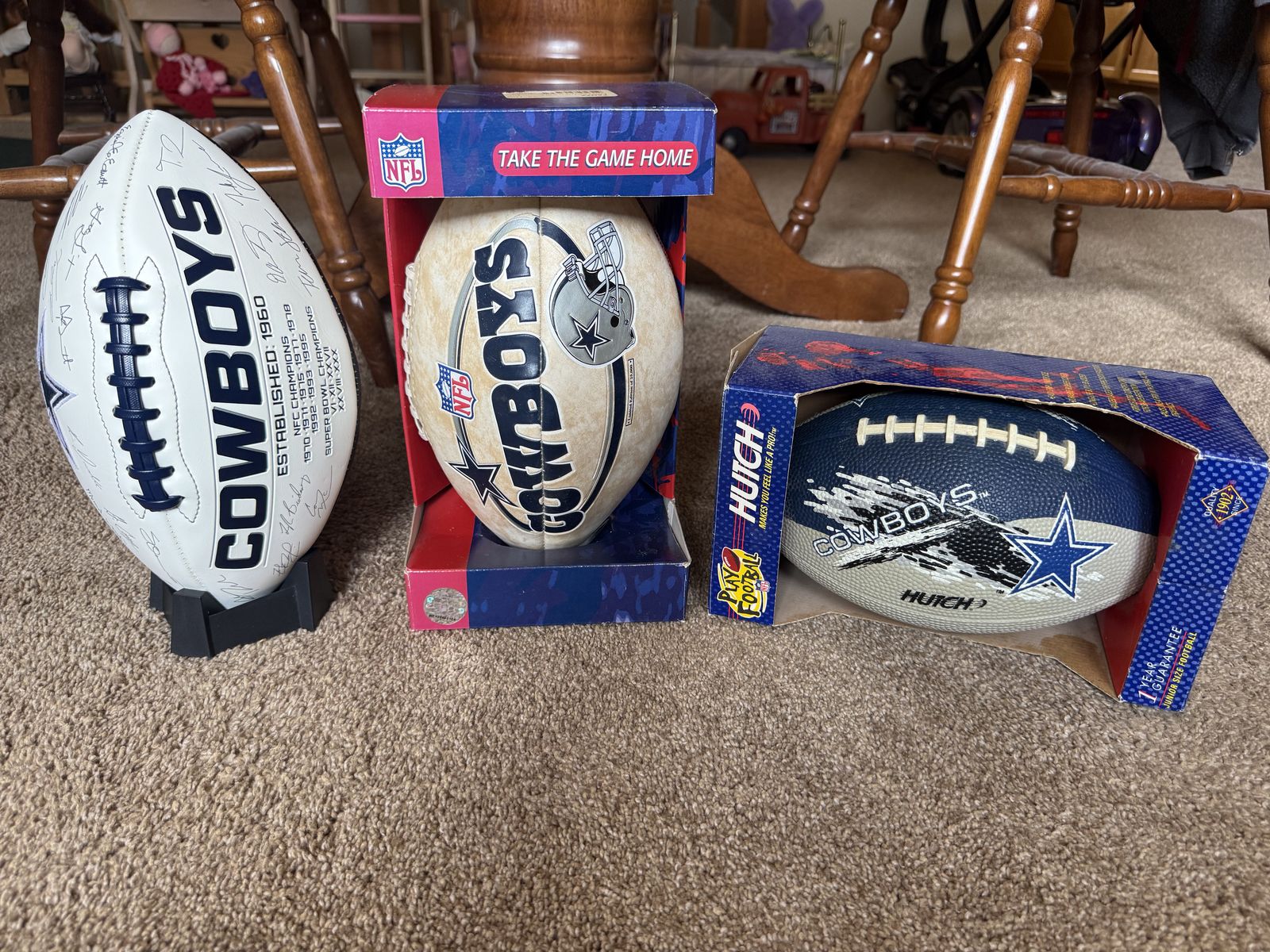 Set of three Dallas Cowboy footballs