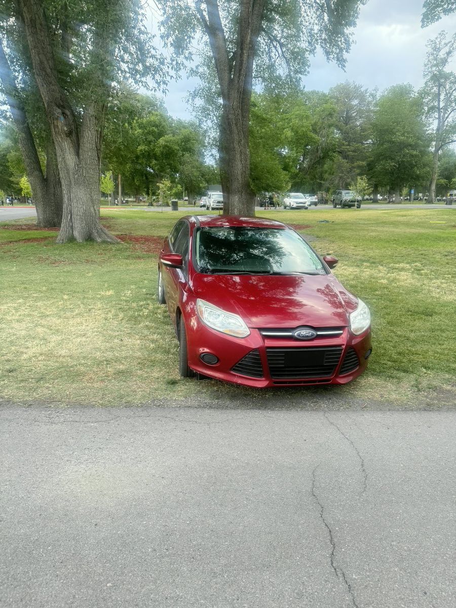 Red 2013Ford Focus Sedan - Reliable, Fuel-Efficient Daily Driver