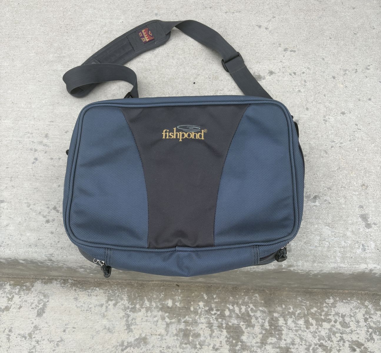 Fishpond Blue and Gray Molded Reel Storage Bag with Adjustable Dividers and Shoulder Strap