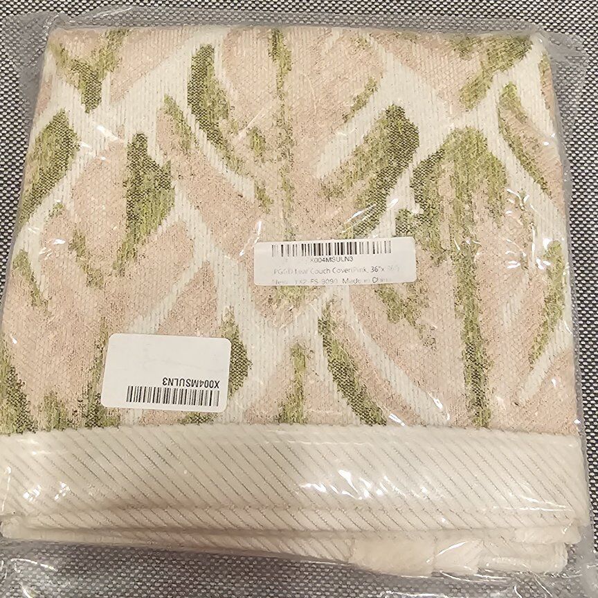 Pink and green leaf couch cover